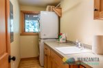 Downstairs laundry room is large with slop sink to rinse out clothes. Detergents included.